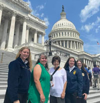 FFA students and staff in front of USA Capital