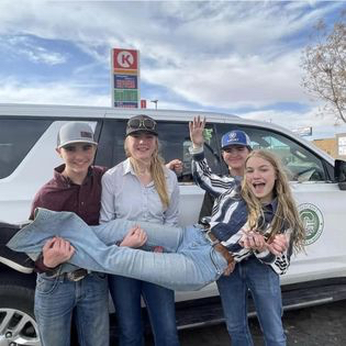 Group of four happy FFA students