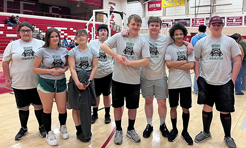 Powerlifting team in the gym