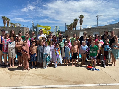 Group picture of summer youth program at pool