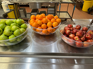 bowls of oranges and apples